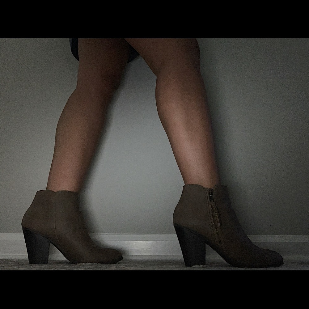 Used boots with mid rise heel.